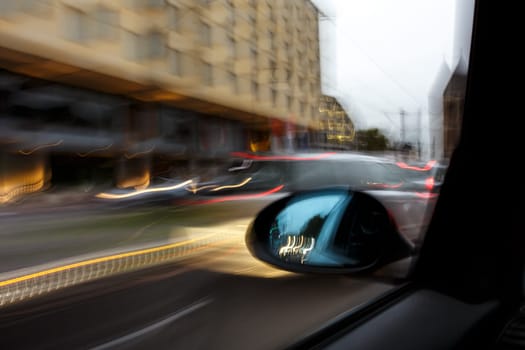 Car driving in the city road trip with speed