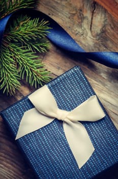 Christmas present on rustic wooden table