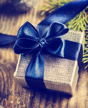 Christmas present on rustic wooden table