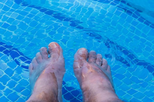 Relaxed day with feet in water