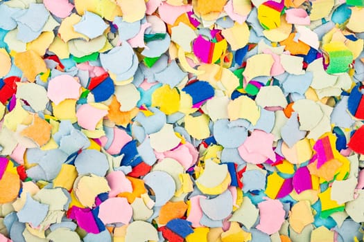 Full frame shot in studio from above shows colorful confetti.