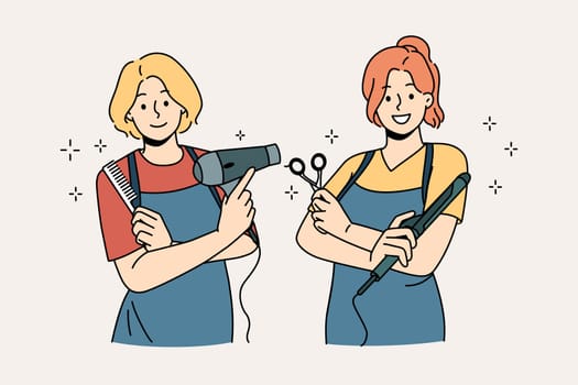 Working as hairdresser in salon concept. Two young smiling girls wearing aprons standing holding working tools in hairdressing salon vector illustration