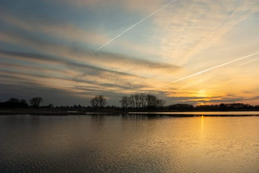 Beautiful sunset and clouds over the lake, Stankow, Poland