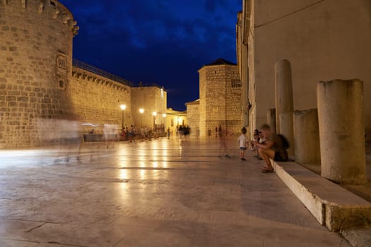 Kamplin square in the historic old town of Krk in Croatia in the evening