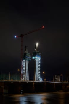 Construction site of the new pylon bridge, the new landmark of the city, over the river Elbe in Magdeburg