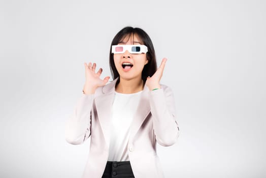 Smiling woman confidence wearing 3d cinema movie glasses red and blue isolated white background, Asian happy portrait beautiful young female in television film studio shot, copy space