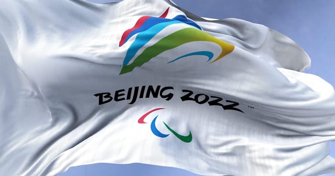 Beijing, CHN, Jan. 2022: Beijing 2022 winter paralympic games flag waving in the wind. Beijing 2022 winter paralympic games are scheduled to take place from 4 to 13 march 2022