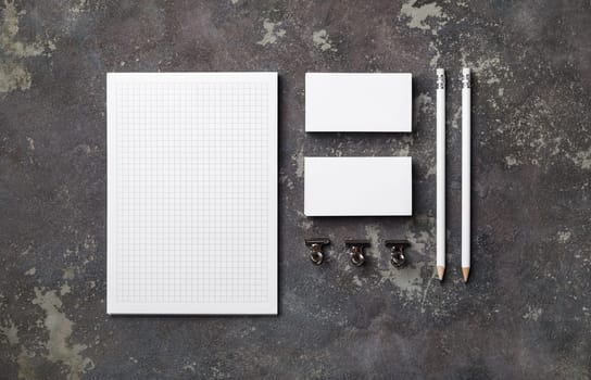 Blank stationery set on concrete background. ID template. Mockup for branding identity for designers. Flat lay.
