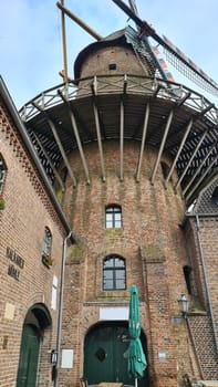 Old windmill on the house in Kalkar, Lower Rhine, Germany