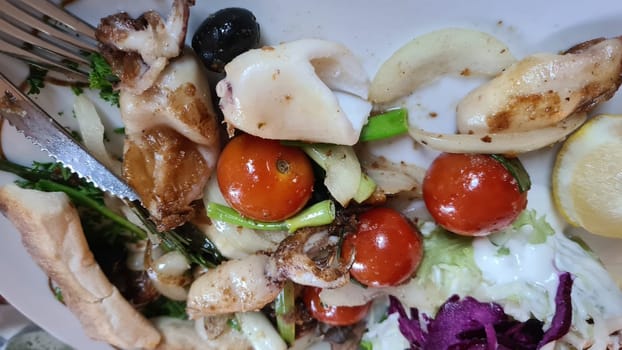 Grilled cuttlefish on tagliatelle with butter sauce
