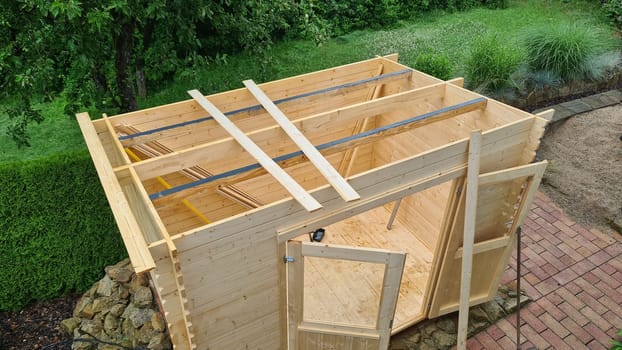 Garden shed built from tree trunks