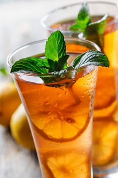 Refreshing ice tea with lemon and mint