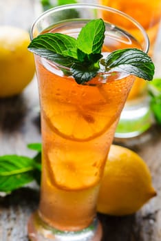 Refreshing ice tea with lemon and mint