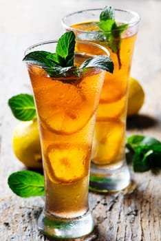 Refreshing ice tea with lemon and mint