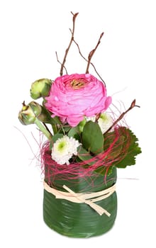 Table decoration or floral arrangement with ranunculus and asters.