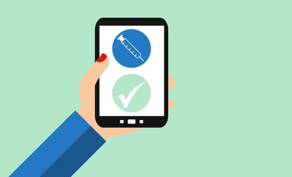 Female hand holding smartphone: Covid-19 vaccination