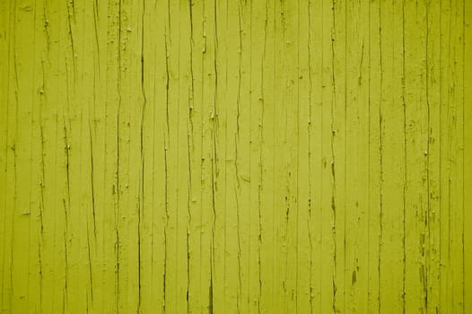 Old weathered wooden planks with yellow color
