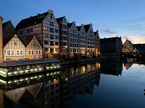 The beauty of the channels of Gdansk during a clear sky night in the north of Poland