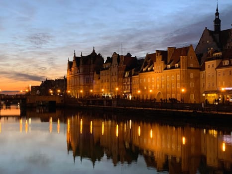 Dramatic picture of the historical buildings of Gdansk on the cold Nowa Motlawa channel in Poland