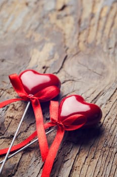 Valentine hearts on rustic wooden table