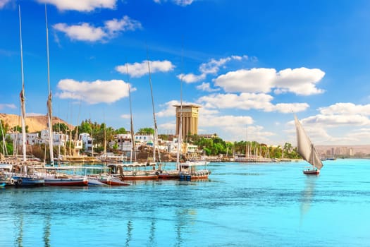 The Nile and the boats near the pier of Aswan, Egypt.