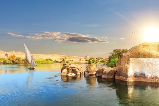 Nile scenery and a sailboat, Aswan, Egypt.