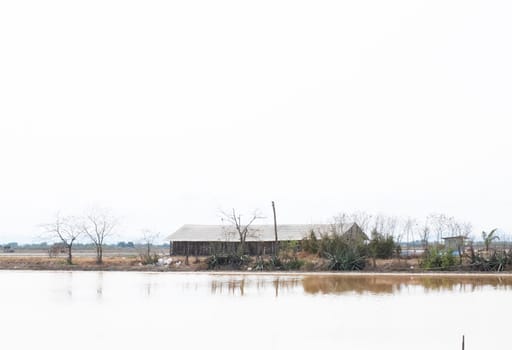 Landscape view of a Salt Storage Shed industry farm. Farmer economic business.