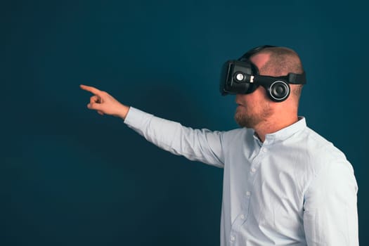 Metaverse digital cyber world technology. Businessman with VR glasses using AR augmented reality. NFT, futuristic lifestyle concept