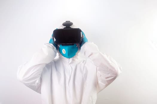 VR medicine. Doctor using virtual reality headset for medical purposes.