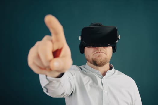 Metaverse digital cyber world technology. Businessman with VR glasses using AR augmented reality NFT, futuristic lifestyle concept