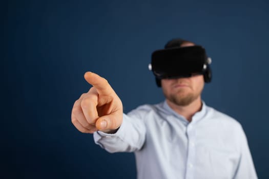 Metaverse digital cyber world technology. Businessman with VR glasses using AR augmented reality. NFT, futuristic lifestyle concept