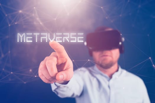 Metaverse digital cyber world technology. Businessman with VR glasses using AR augmented reality NFT, futuristic lifestyle concept