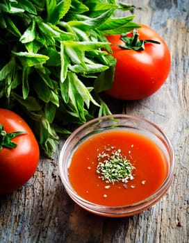 Tomato sauce on rustic wooden table
