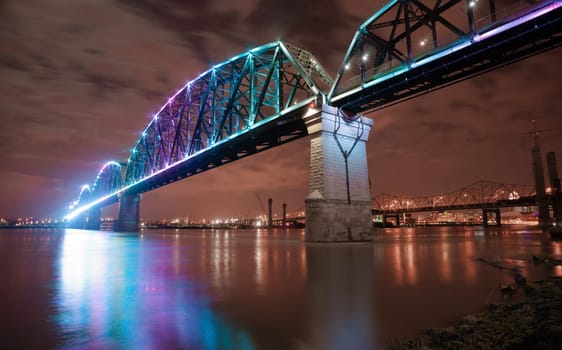 The Big Four Bridge is a six-span former railroad truss bridge that crosses the Ohio River, connecting Louisville, Kentucky, and Jeffersonville, Indiana, United States