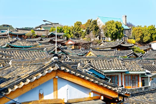 Traditional Korean style architecture at Bukchon Hanok Village in Seoul, South Korea.