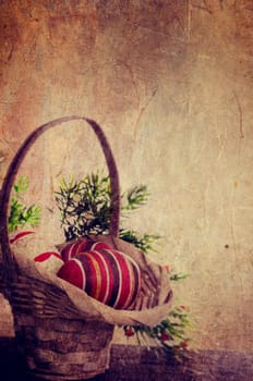 Easter eggs in basket with grunge texture