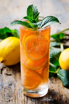 Refreshing ice tea with lemon and mint