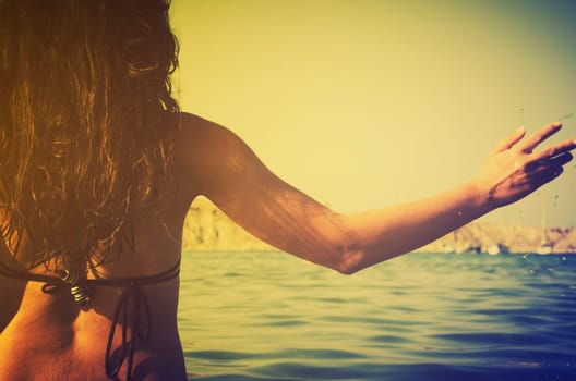 Retro image of girl in the sea