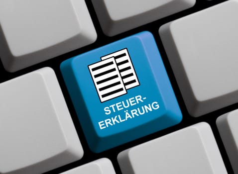 Blue computer keyboard showing tax declaration in german language