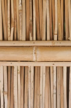 Old brown tone bamboo plank fence texture .