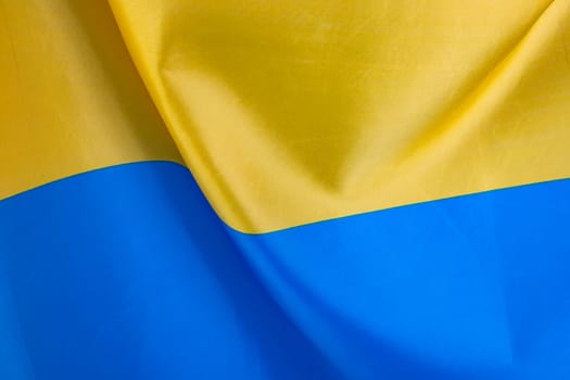 Flag of Ukraine, UA. Blue and yellow colors. Close up shot, background