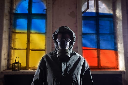 Concept of Russian forces capturing the Cernobyl power plant. Person with gas mask and the Ukrain and Russian flag