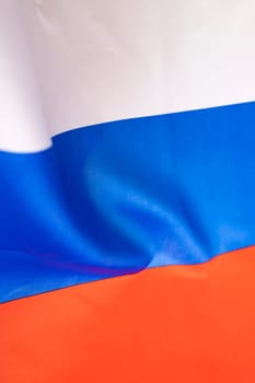 Waving colorful national flag of russia. Russian-Ukrainian conflict concept