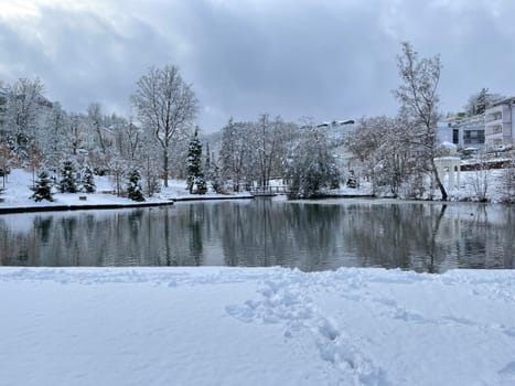 Spa park with fountain in winter,in the spa town of Bad Schwalbach in Hesse. Spa park with fountain in winter,in the spa town of Bad Schwalbach in Hesse.