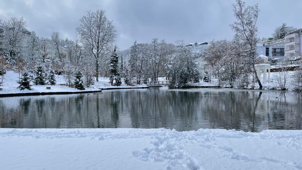 Spa park with fountain in winter,in the spa town of Bad Schwalbach in Hesse. Spa park with fountain in winter,in the spa town of Bad Schwalbach in Hesse.