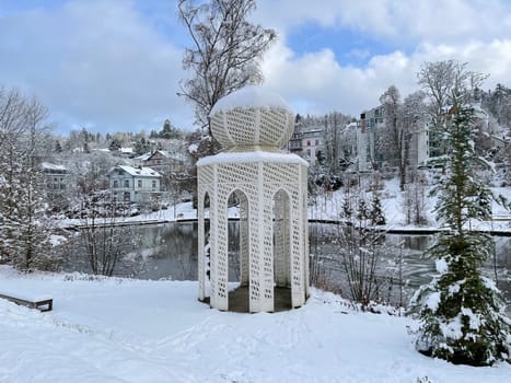 Spa park with fountain in winter,in the spa town of Bad Schwalbach in Hesse. Spa park with fountain in winter,in the spa town of Bad Schwalbach in Hesse.