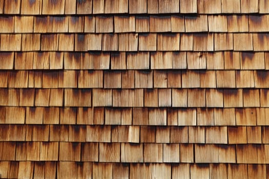 Abstract wooden texture of cedar shingles in Austria