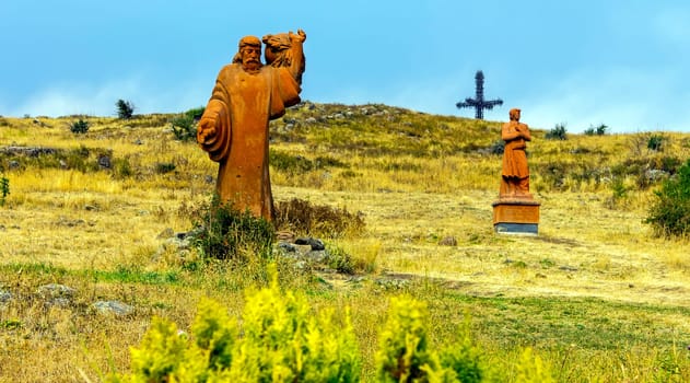 MOUNT ARAGATS,ARMENIA - SEPTEMBER 25,2017:Statues creator Armenian Alphabet - Mesrop Mashtots and his disciple on Mount Aragats, park of letters ( Armenian Alphabet),Armenia.