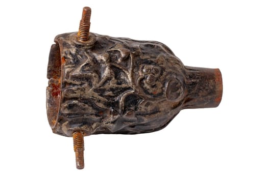 Closeup of an antique cast iron acorn-shaped Christmas tree holder for attaching the Christmas tree to the rotating Christmas tree stand. Clipping path. Macro.