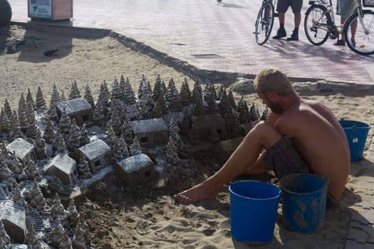 CRAN CANARIA, MELONERAS - NOVEMBER 13, 2019:.Christmas Village of sand on the beach of Cran Canaria in Meloneras